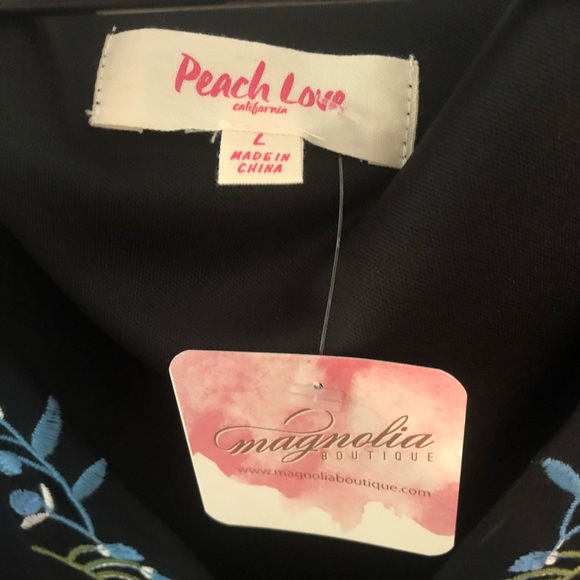 Beautiful black top with the tags on - Picture 3 of 3